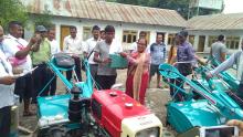 rural municipality deputy head distributing agro machinaries to local farmer 
